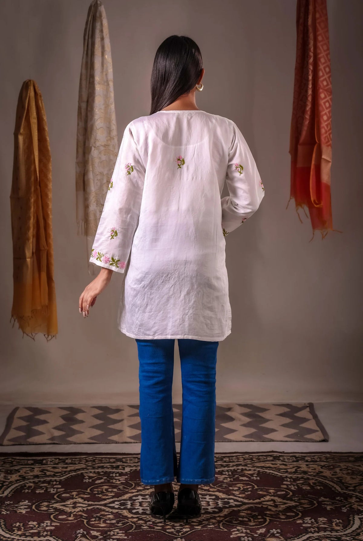 Aarohi ivory white Chanderi hand-embroidered Chikankari short kurta tunic top.