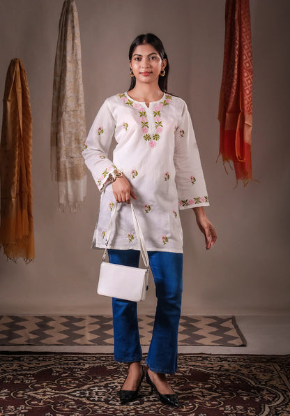 Aarohi ivory white Chanderi hand-embroidered Chikankari short kurta tunic top.