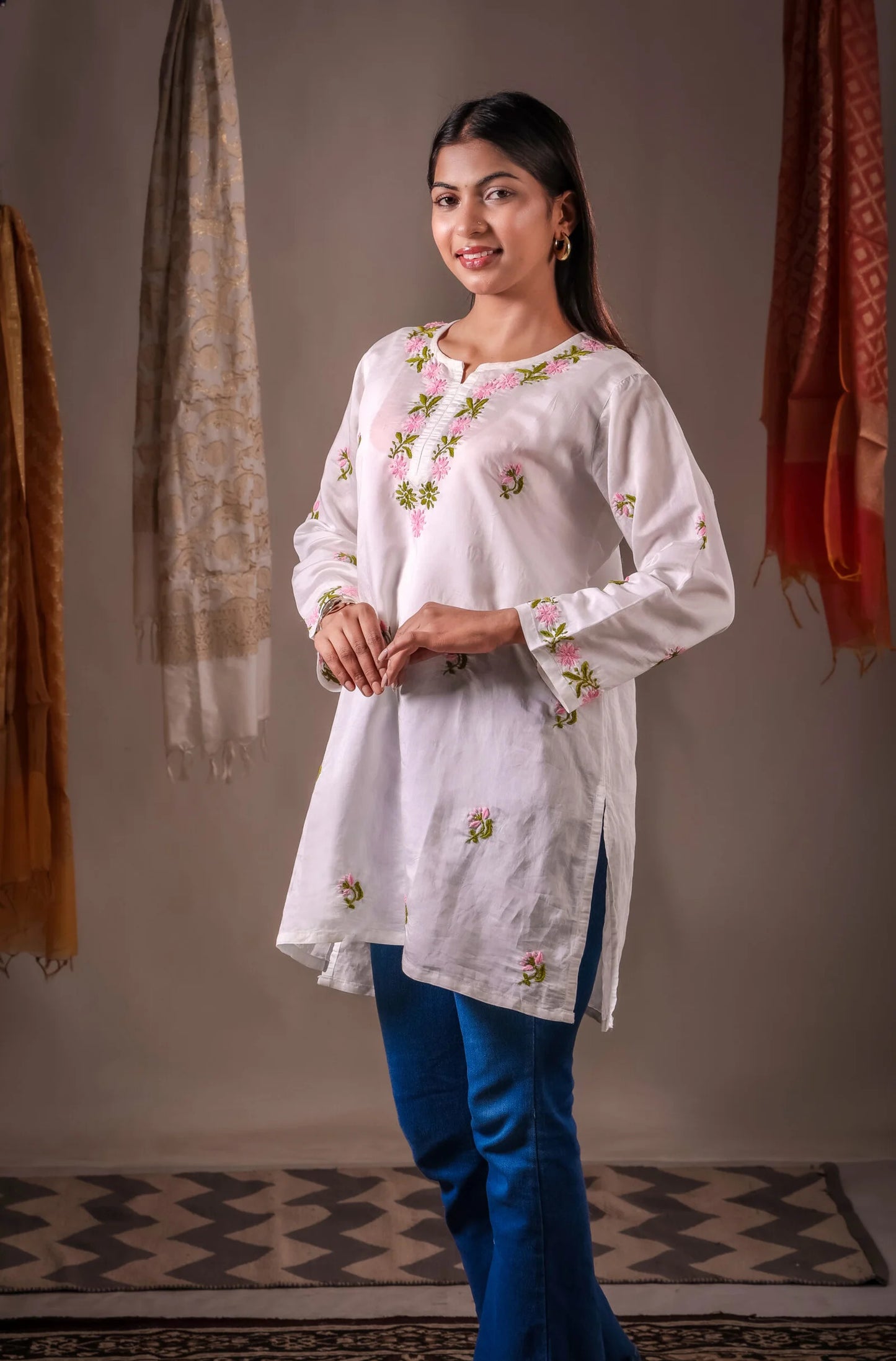 Aarohi ivory white Chanderi hand-embroidered Chikankari short kurta tunic top.